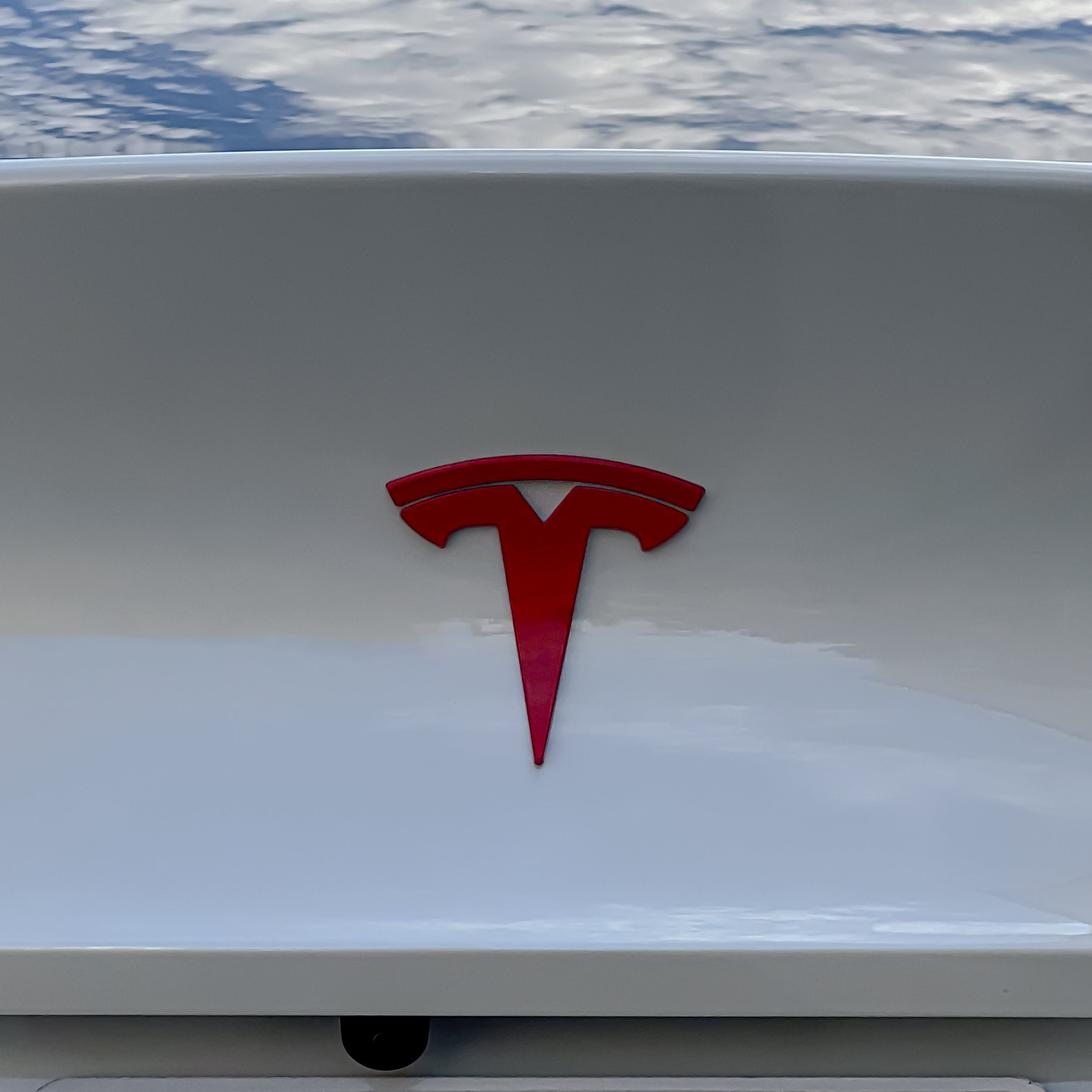 Glossy Red Tesla Logo Emblem Cover