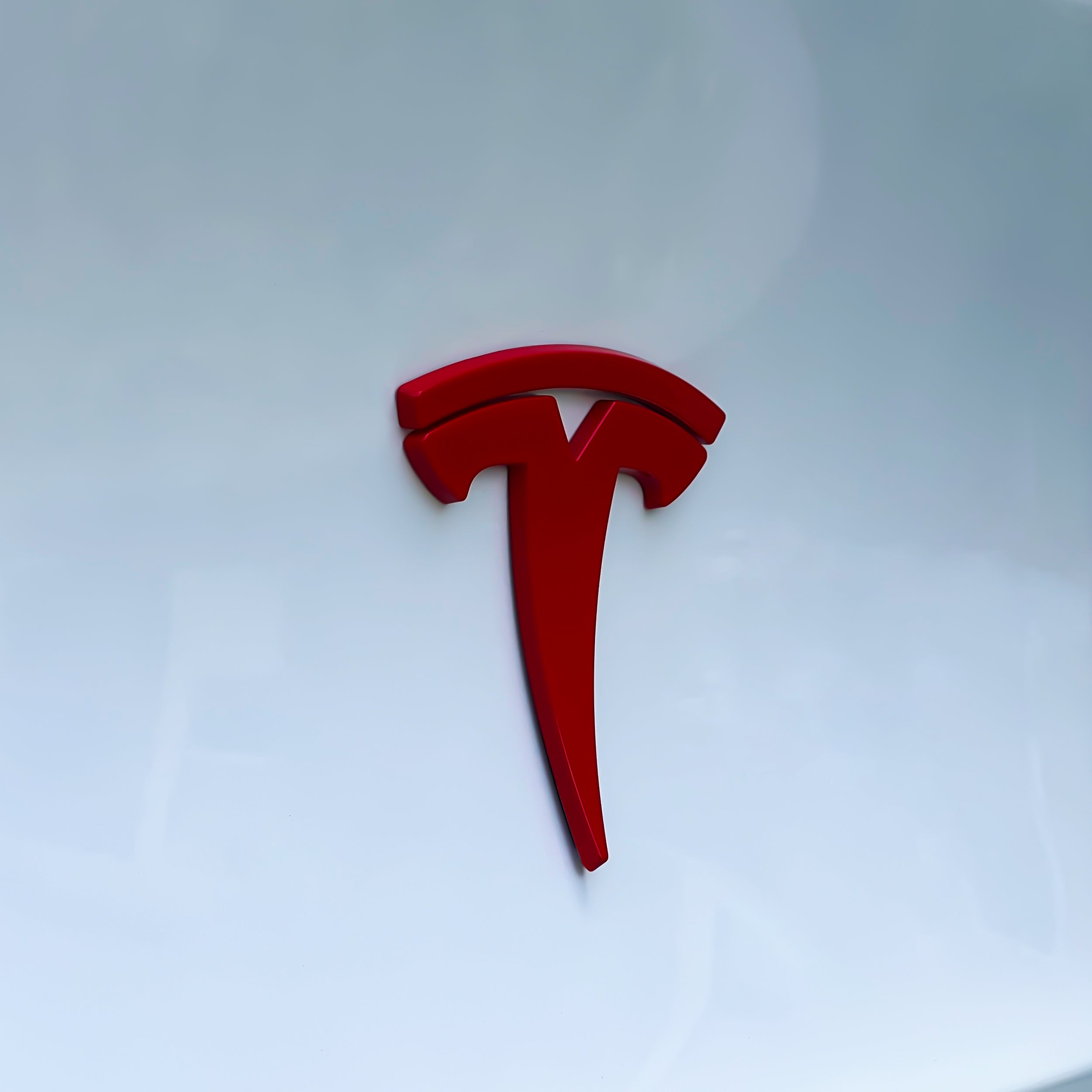 Glossy Red Tesla Logo Emblem Cover